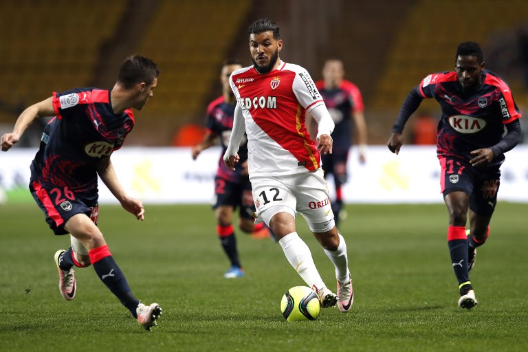 Monaco's French-Algerian midfielder Fares Bahlouli (C) vies with Bordeaux's French defender Frederic Guilbert (L) during the French L1 football match Monaco vs Bordeaux on April 1, 2016 at the "Louis II Stadium" in Monaco. AFP PHOTO / VALERY HACHE / AFP PHOTO / VALERY HACHE