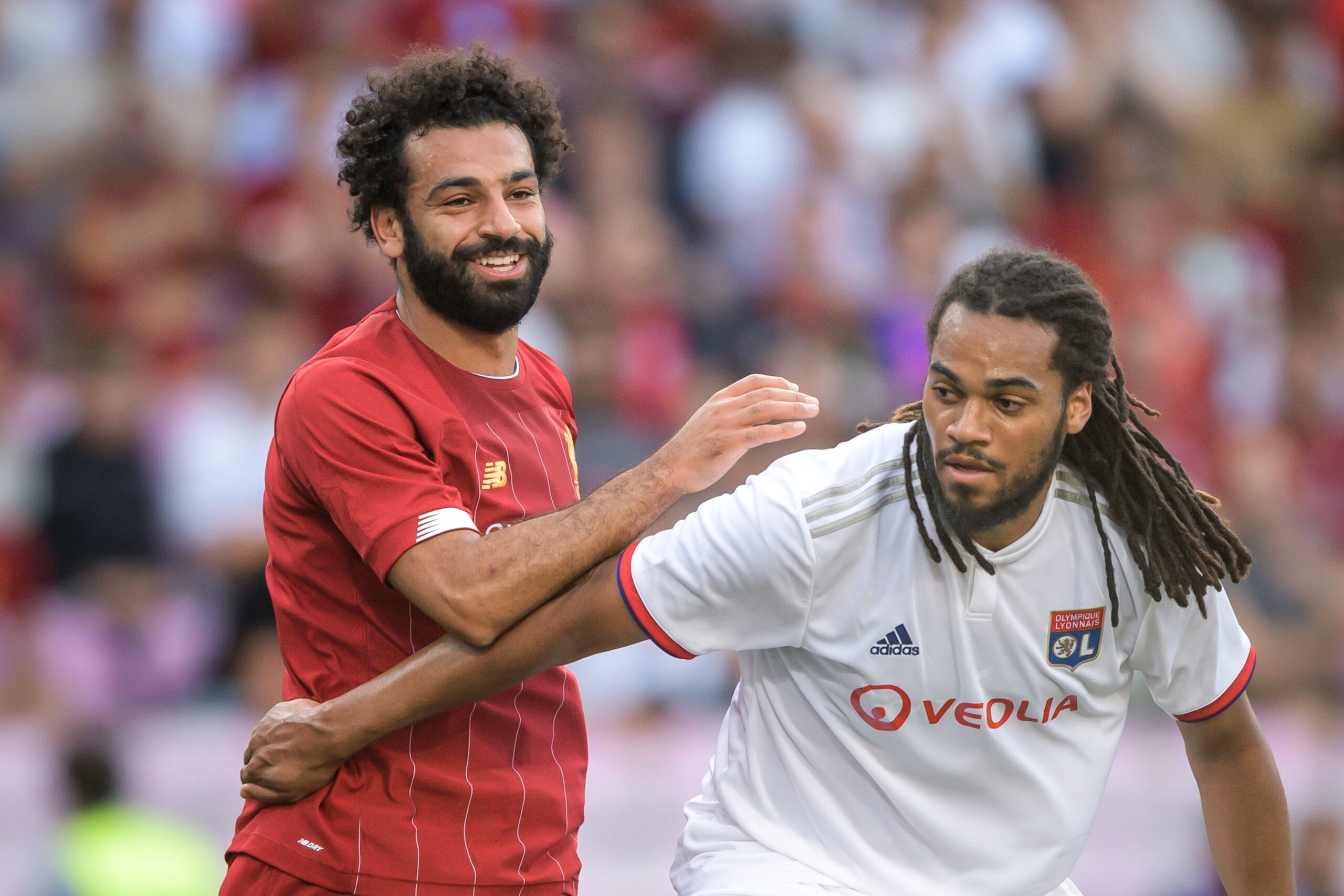 Mohamed Salah face à Jason Denayer lors d'un amical OL - Liverpool