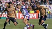Bergougnoux (Toulouse) au milieu de Toulalan et Benzema (OL)