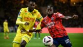 Castello Lukeba face à Evann Guessand lors de Nantes - OL