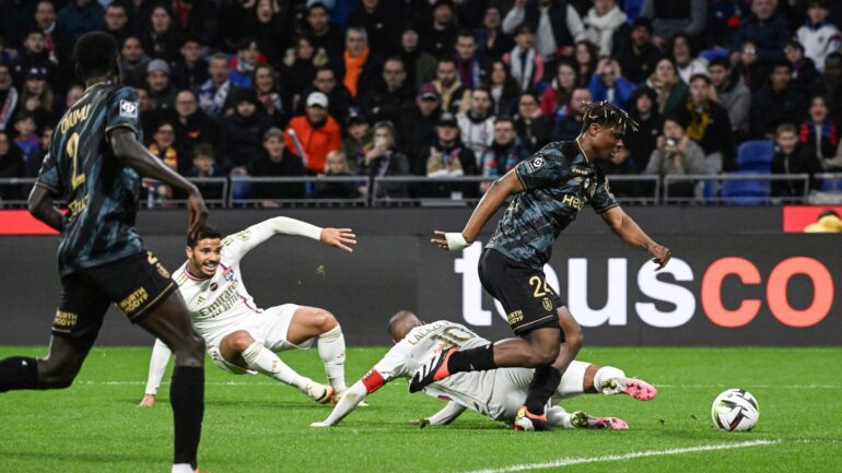 Henrique et Alexandre Lacazette lors d'OL - Reims