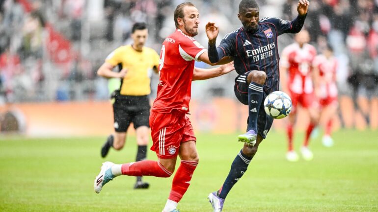 Clinton Mata (OL) devant Harry Kane (Bayern Munich)