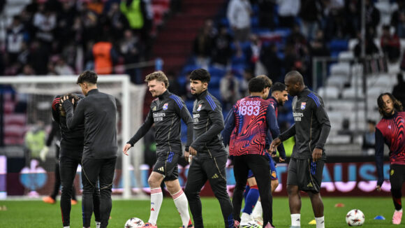 Les joueurs de l'OL à l'échauffement contre le FC Bâle